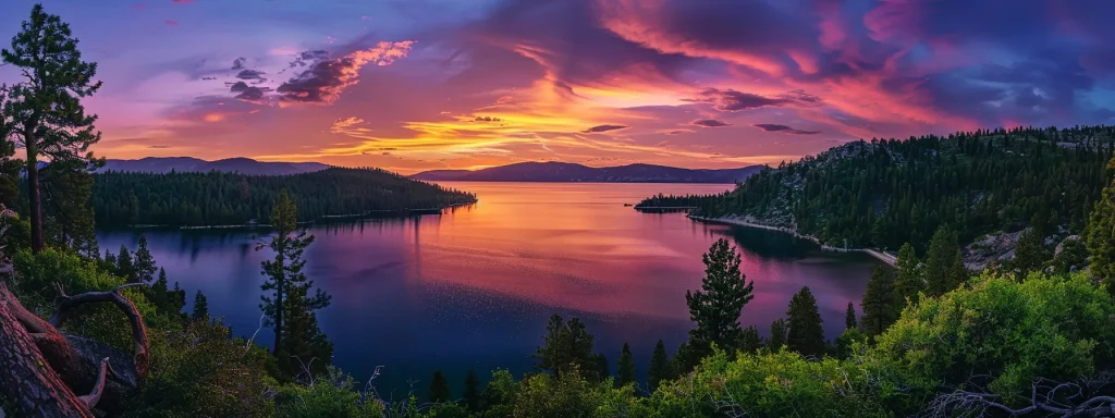 a vibrant sunset casts a warm glow over a serene lake, reflecting the brilliant hues of orange, pink, and purple in the sky, framed by lush green trees on either side.